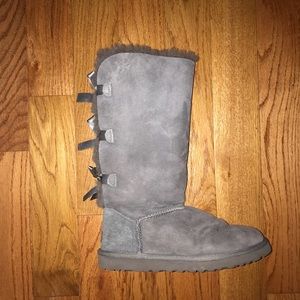 Tall grey bow UGG boots